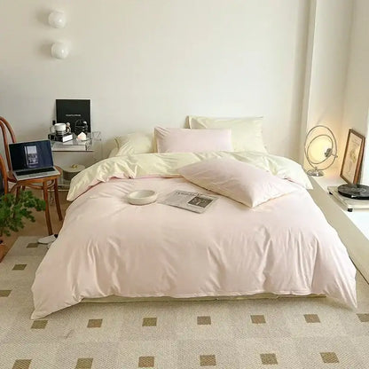 Soft lavender cotton queen bedding set with pastel pink duvet and matching pillows in smooth satin finish fabric