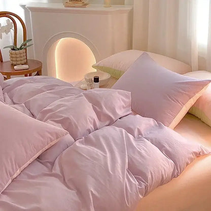 Soft lavender cotton queen bedding set with quilted comforter and matching pillowcases featuring plush texture