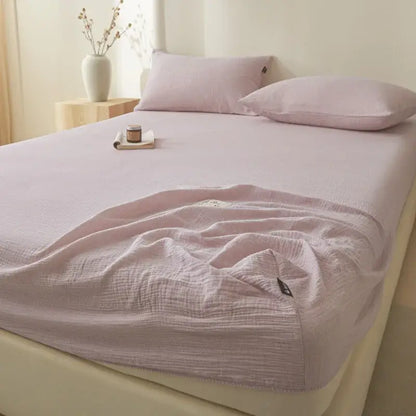 Soft light gray cotton fitted sheet with a soft lavender tone and subtle textured weave for decorbites cotton fitted bed cover