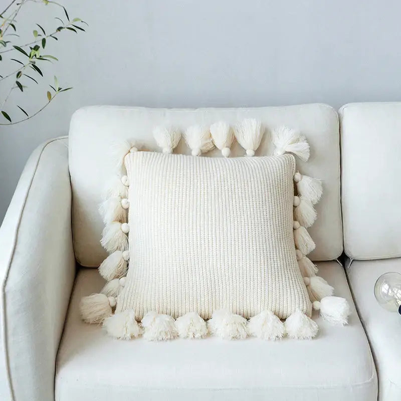 Cream-colored soft tassel knit cushion cover with fluffy tassels on all sides for living room decorbites decor