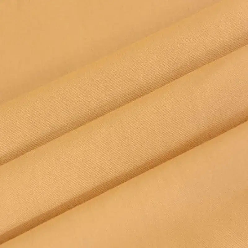 Soft yellow and beige cotton fitted sheet with a smooth textured weave for bedroom decorbites cotton fitted bedding