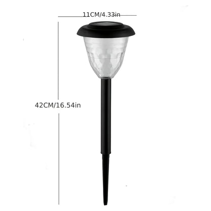 Black outdoor waterproof solar-powered garden path light with clear faceted glass shade and sleek plastic stem