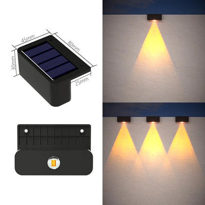 Black rectangular solar-powered datura lantern wall light with motion sensor and warm yellow led for outdoor garden decor