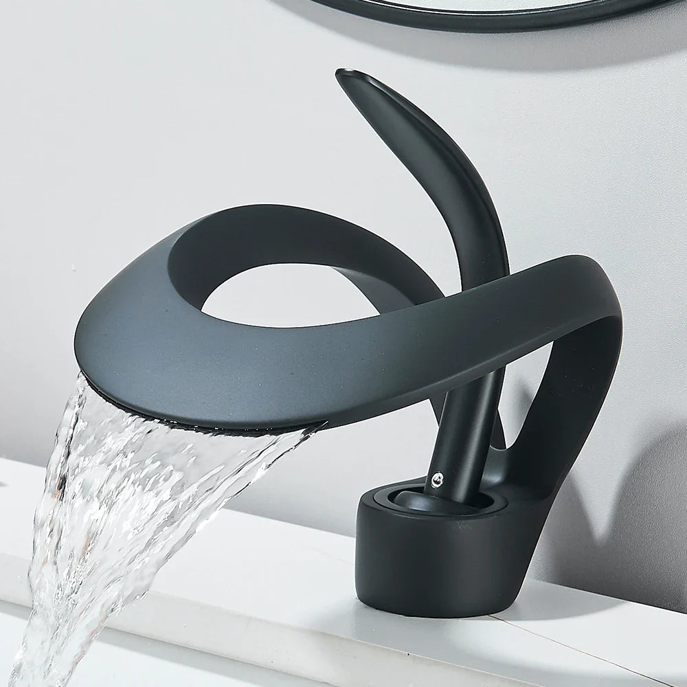 Black matte solid brass waterfall basin faucet single hole with sleek design for cold water bathroom sink use