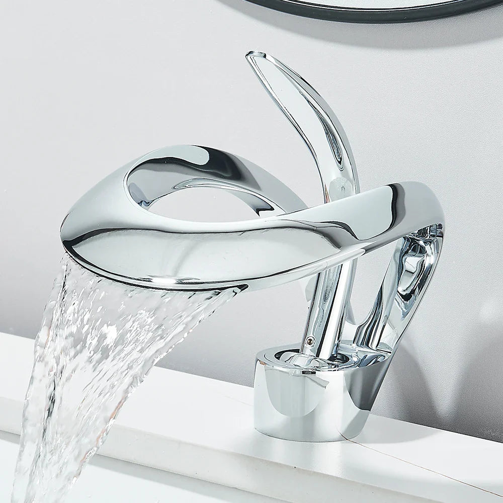 Chrome finished solid brass single hole waterfall basin faucet with sleek modern design for cold water bathroom sink