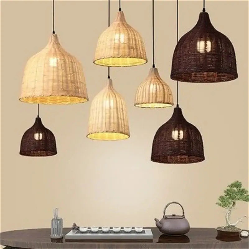 Handwoven rattan pendant light in natural and dark brown tones with ribbed texture and warm interior lighting for dining room