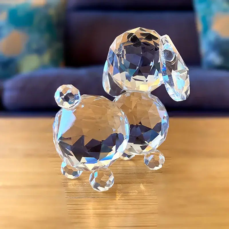 Sparkling clear crystal dog figurine with faceted transparent body and polished surfaces for bedroom decor