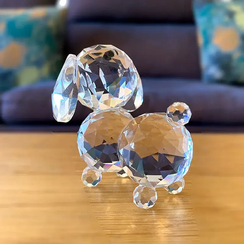 A clear faceted crystal dog figurine with polished reflective surface for sparkling bedroom decor ornament