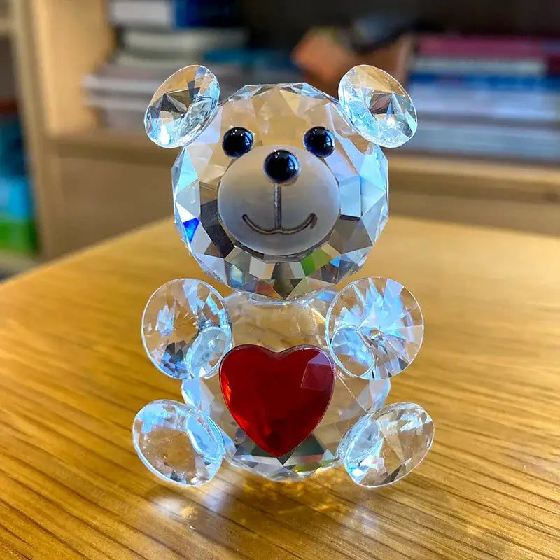 Sparkling crystal bear figurine with black bead eyes and red heart held in paws for decorbites crystal bear decor