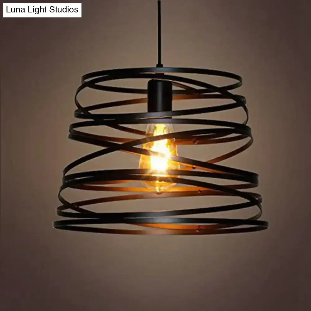 Black wrought iron spiral spring suspension pendant light with exposed edison bulb for black and white dining room