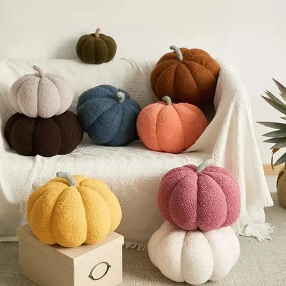 Soft plush stacked 3d pumpkin throw pillow in warm yellow orange pink and blue fleece decor for living room