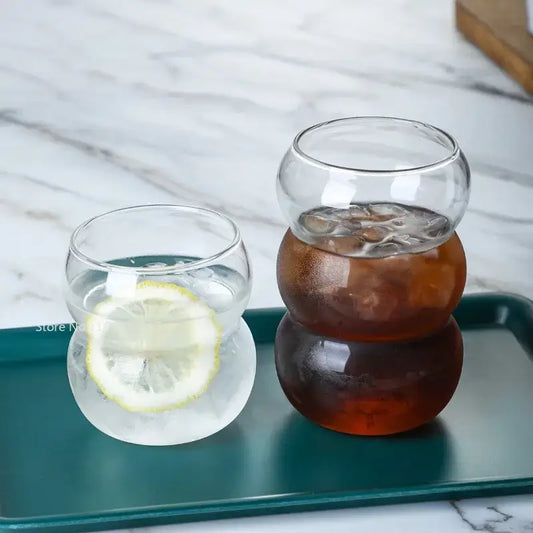 Clear glass cold brew coffee tumblers with stacked rounded design and textured surfaces for brew coffee cup use
