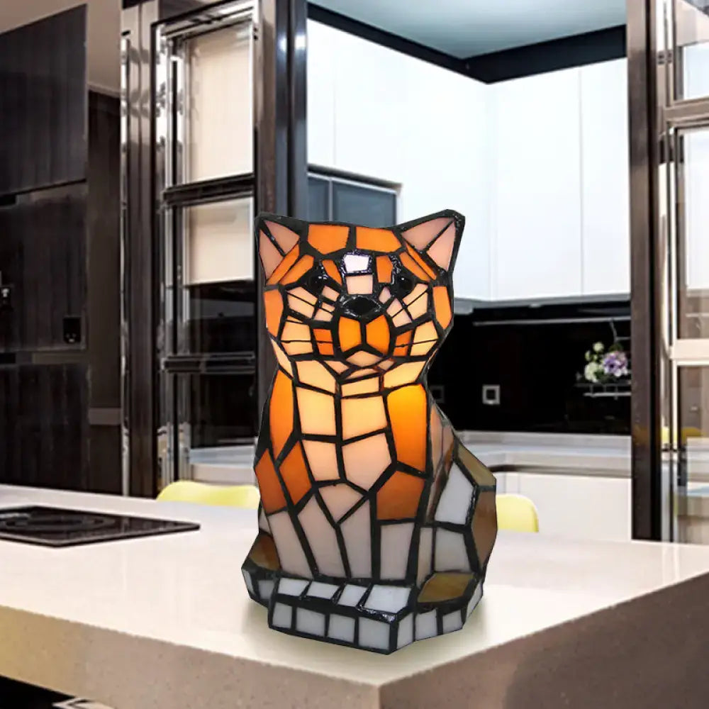 Stained glass brown cat shade accent lamp featuring warm orange and white mosaic tiles for bedroom table light