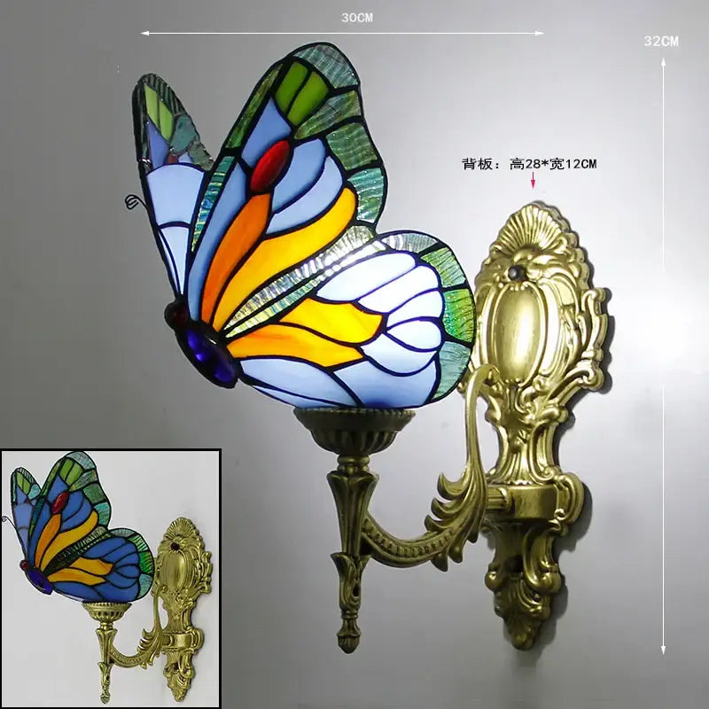 Vibrant stained glass butterfly wall sconce with ornate gold metal bracket perfect for living room decorbites butterfly stained wall sconces