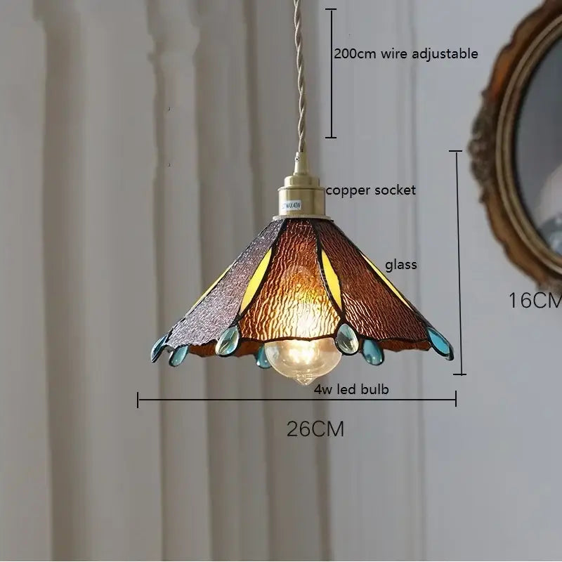 Stained glass floral pendant light with warm tones and teal accents featuring colorful glass copper finish decorbites design