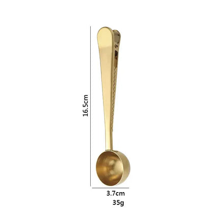 Gold-colored stainless steel coffee spoon with sealing clip measuring 16.5cm by 3.7cm weighing 35g kitchen accessory