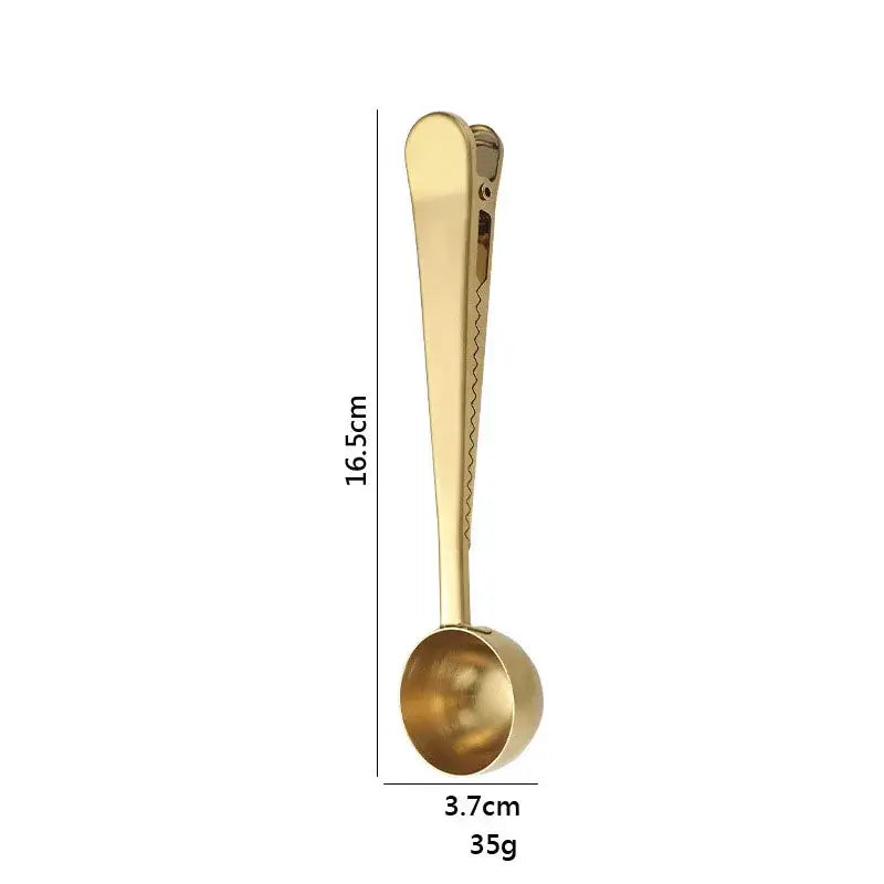 Gold-colored stainless steel coffee spoon with sealing clip measuring 16.5cm by 3.7cm weighing 35g kitchen accessory