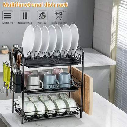 Black metal stainless steel curved kitchen drying rack with three-tier dish organizer shelf holding plates and mugs