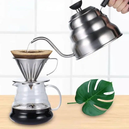 Shiny stainless steel pour-over coffee dripper with ridged conical shape on glass carafe for decorbites gooseneck coffee kettle use