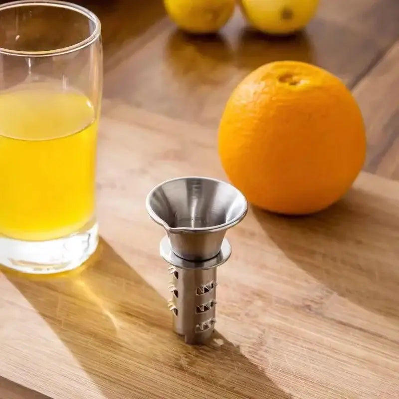Stainless steel lemon squeezer juicer with conical top and perforated base for kitchen by decorbites lemon squeezer