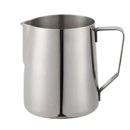 Stainless steel milk frothing jug with measurements featuring a sleek reflective surface and sturdy handle for milk frothing