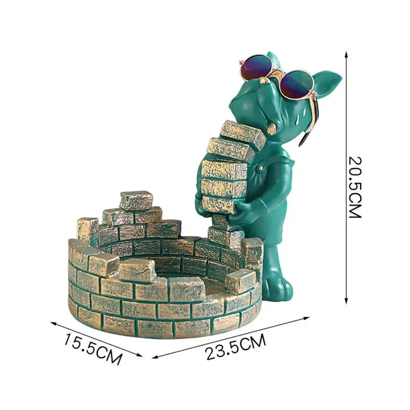 Teal decorbites dog statue holding bricks beside matching brick ashtray as stylish dog statue storage box decor