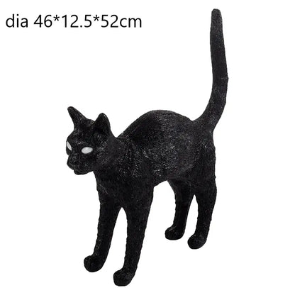 Stylized black and white cat resin table lamp with glossy finish and glowing eyes by decorbites black cat for bedroom decor