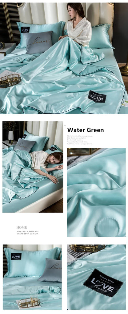 Summer mulberry silk comforter with water green satin bedding set and black love branded pillowcases in queen size