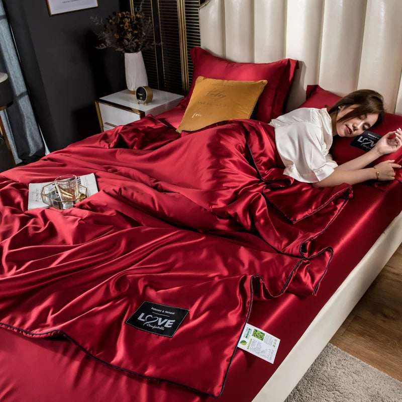 Rich crimson satin duvet cover set with glossy finish and matching pillowcases for summer mulberry silk bedding