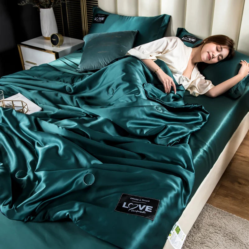 Teal satin summer mulberry silk comforter duvet insert with glossy finish and black embroidered love label on corner