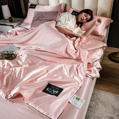 Pink satin summer mulberry silk comforter duvet insert with black piping and love branded patch for luxury bedding
