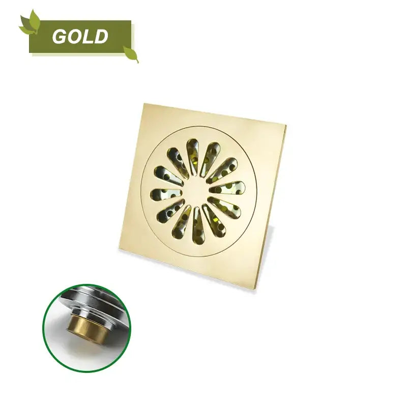 Gold-colored decorbites brass square floor drain with circular petal pattern for brass square shower use
