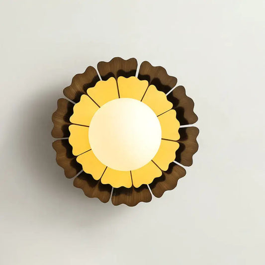 Sunflower yellow and wood wall sconce with matte white glass ball and layered petal shades for bedroom lighting