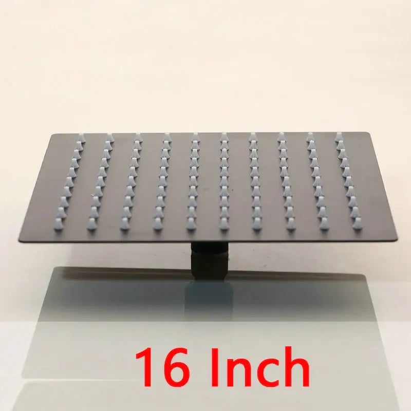 Super slim matte black 16-inch square shower head with black matte finish and grid of rounded nozzles bathroom fixture