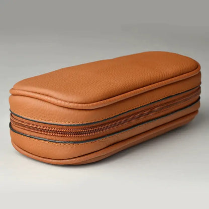 Tan cowhide leather pipe case with textured surface and dual zippers for office storage by decorbites cowhide leather