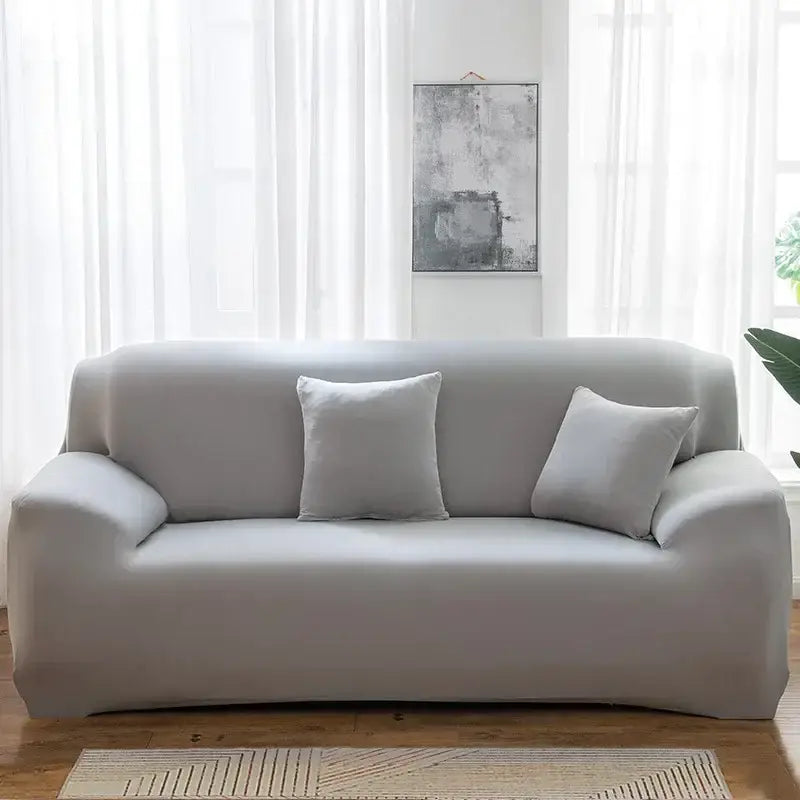 Light gray stretchy silk sofa cover with two matching pillows for living room and accent chairs