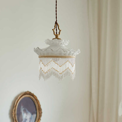 Vintage-style tassel chandelier with glass beads and brass frame ideal for dining room bedside and hallway lighting