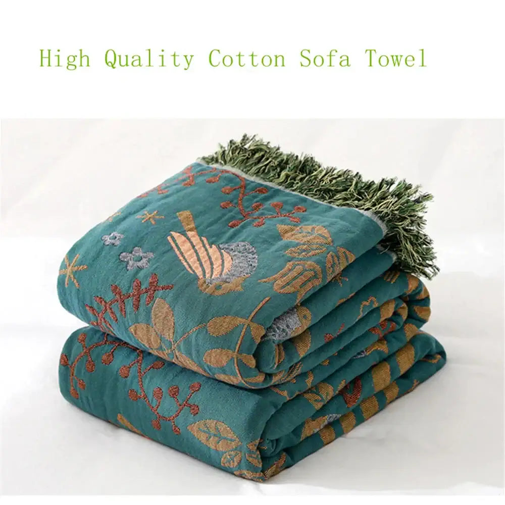 Teal birds jacquard cotton sofa cover with embroidered gold brown gray bird and leaf patterns and green fringe decorbites