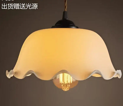 Cream-colored translucent glass pendant light with scalloped edge and exposed edison bulb for decorbites blue glass pendant lights