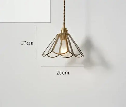 Teal blue glass pendant light with antique brass petal-shaped frame and dark chain perfect for dining room decorbites blue glass pendant