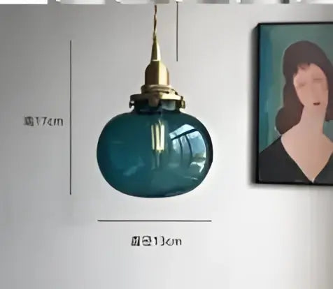 Teal blue glass pendant light with brass hardware ideal for dining room featuring decorbites blue glass pendant lights