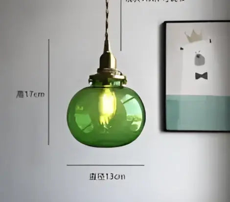 Teal blue glass pendant light with brass hardware featuring green glass and brass accents for dining room decorbites blue glass pendant lights