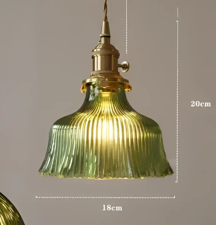 Vintage-style teal blue glass pendant light with ribbed shade and brass hardware ideal for dining room pendant lights