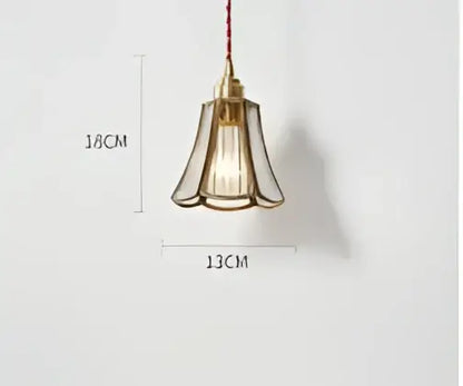 Teal blue glass pendant light with brass hardware and fluted glass shade featuring exposed filament bulb for dining room decorbites blue glass pendant lights