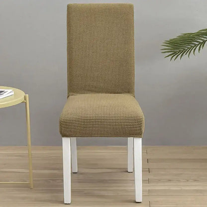Beige checkered stretch chair cover showcasing decorbites blue quilted chair protector for dining room use