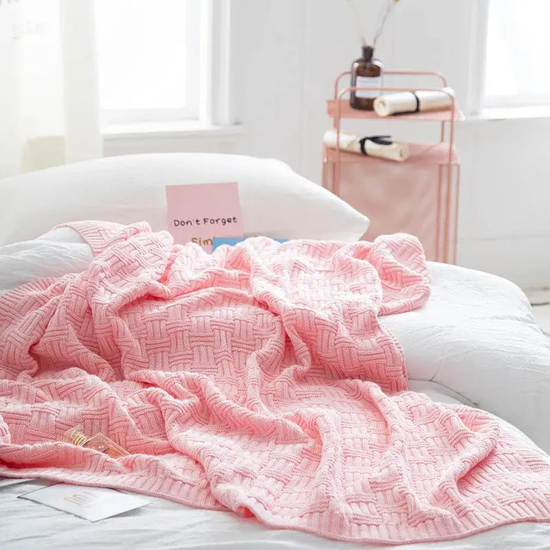 Pink woven knit throw blanket showcasing decorbites cozy jacquard design ideal for living room decorbites cozy use