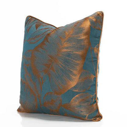 Teal and gold banana tree leaves cushion cover with satin finish and jacquard fabric for living room decor