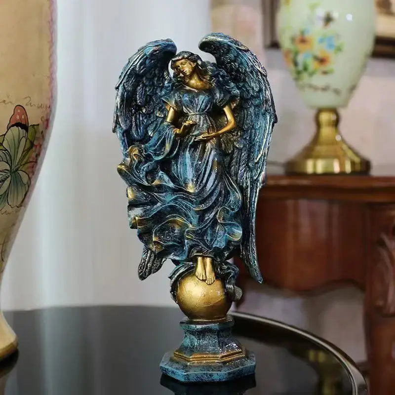 Detailed teal and gold prayer angel goddess statue with outstretched wings on ornate base for greek mythology decor