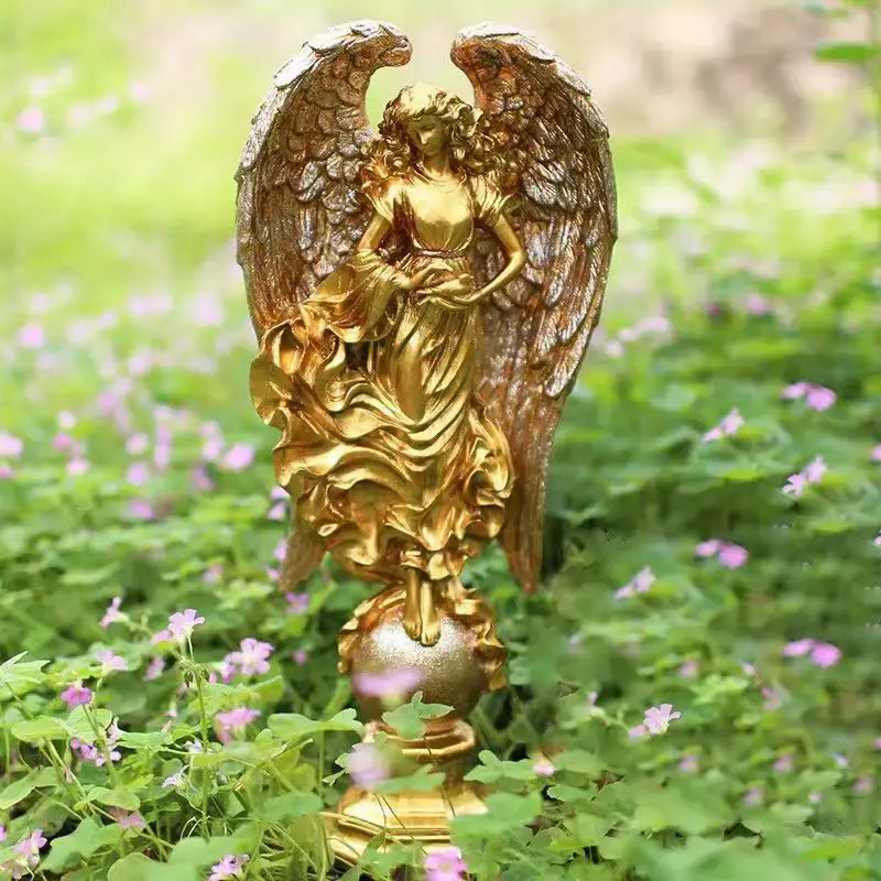 Golden prayer angel goddess statue with detailed wings and flowing robes on decorative base for greek mythology decor