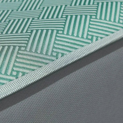 Teal herringbone silky soft fitted sheet set featuring a teal and white woven patterned mat with ribbed edge